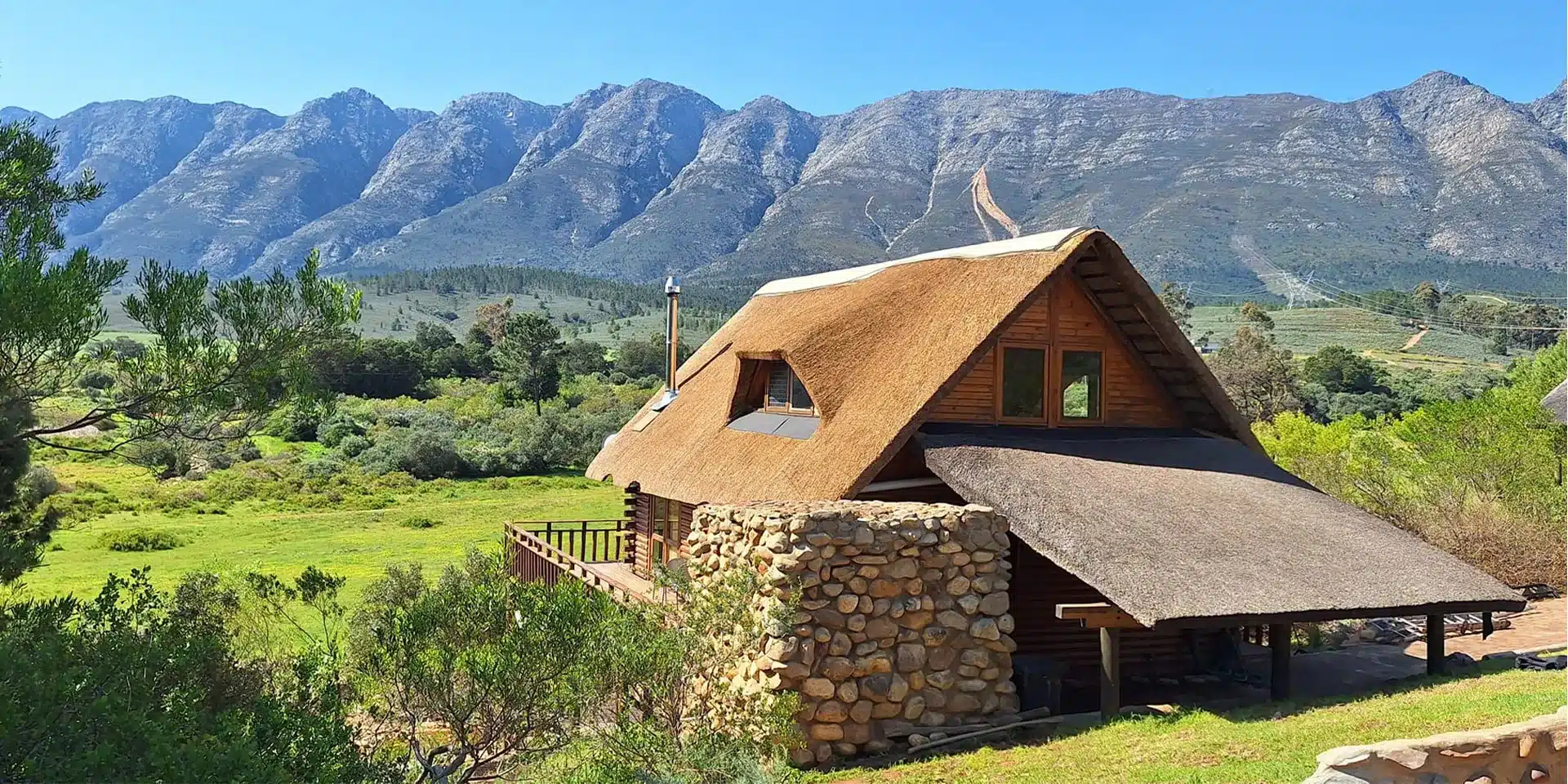 Traditional Thatch Roof Log Cabin Home in Tulbagh